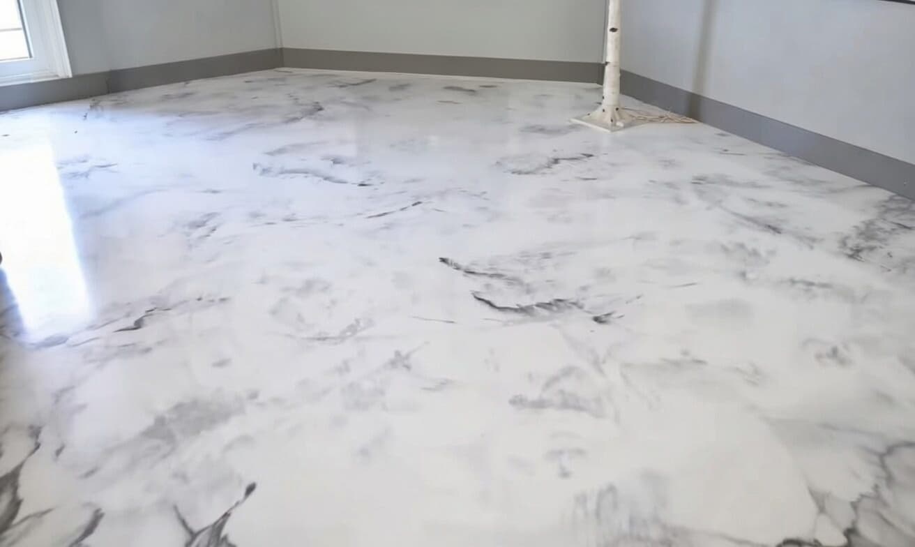 Carrara White Marble metallic epoxy flooring example – stunning swirl pattern in Toronto