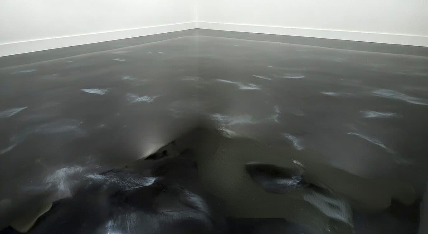 Graphite Mist metallic epoxy flooring example – stunning swirl pattern in Toronto