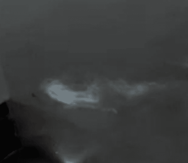 Custom Black Base & Silver Epoxy metallic epoxy flooring example – stunning swirl pattern in Toronto