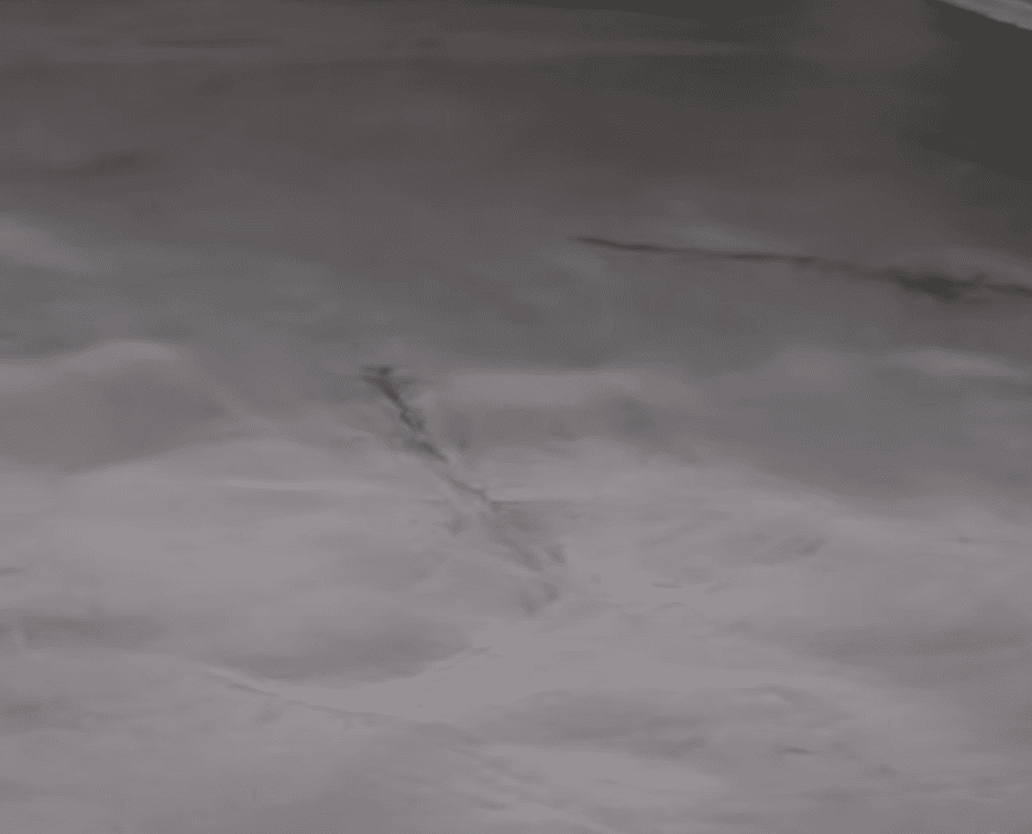 Silver and Black highlights metallic epoxy flooring example – stunning swirl pattern in Toronto