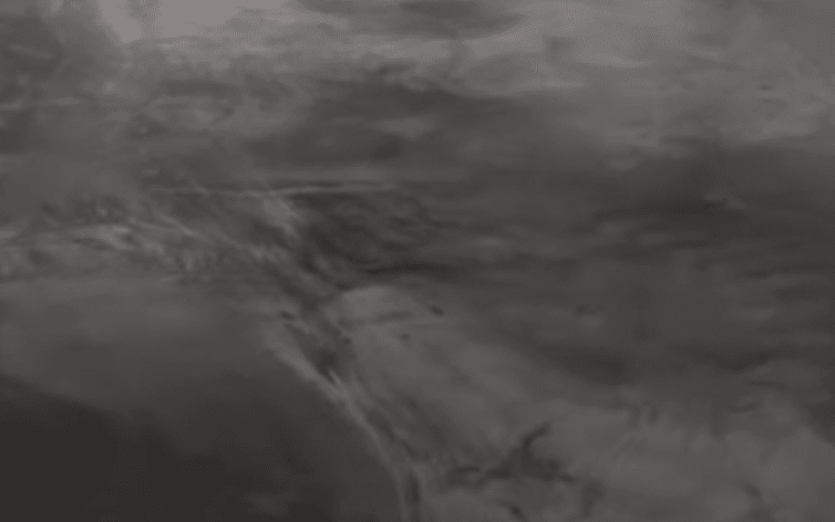 Silver and black Metalic - Silver and black 50/50 metallic epoxy flooring example – stunning swirl pattern in Toronto